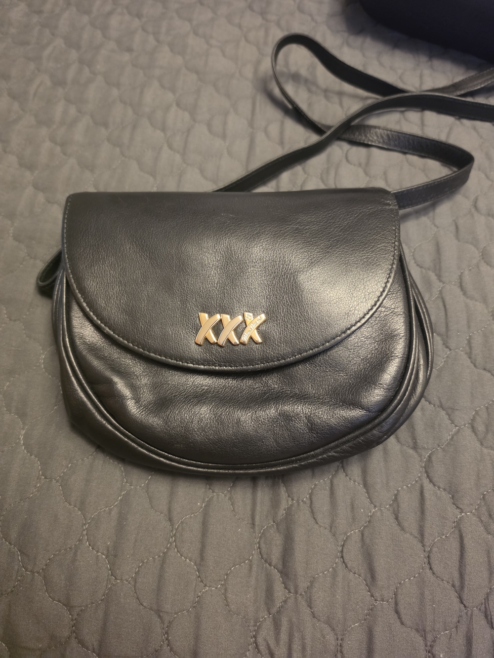 Black Crossbody Saddle Bag with Gold Accent